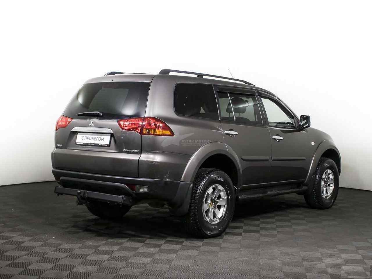 Митсубиси паджеро спорт 2012 год. Pajero Sport 2012. Mitsubishi Pajero Sport коричневый 2012. Паджеро спорт 2012г. Митсубиси Паджеро спорт 2012 года.