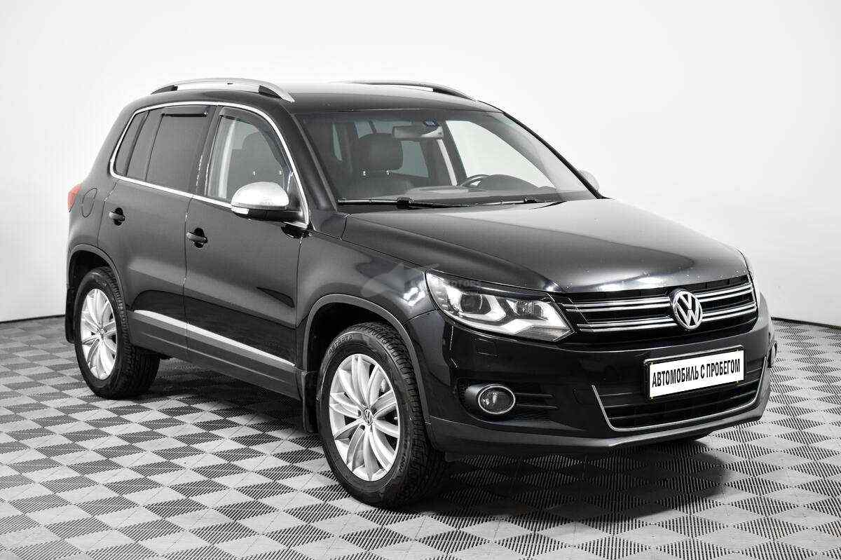 Фольксваген Тигуан автомат. Volkswagen Tiguan 2015 черный. Фольксваген Тигуан 2013 салон.