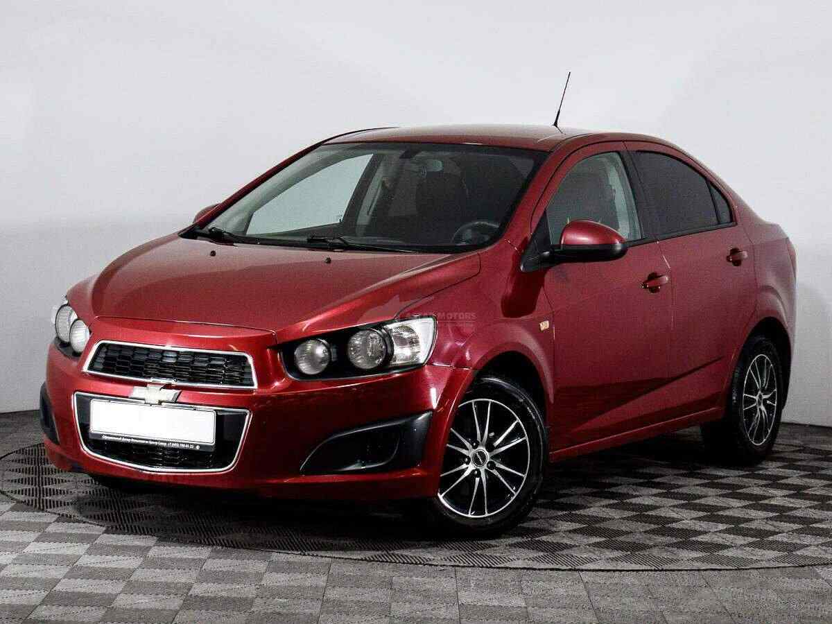 Шевроле авео отзывы. Chevrolet Aveo 2015 красная.