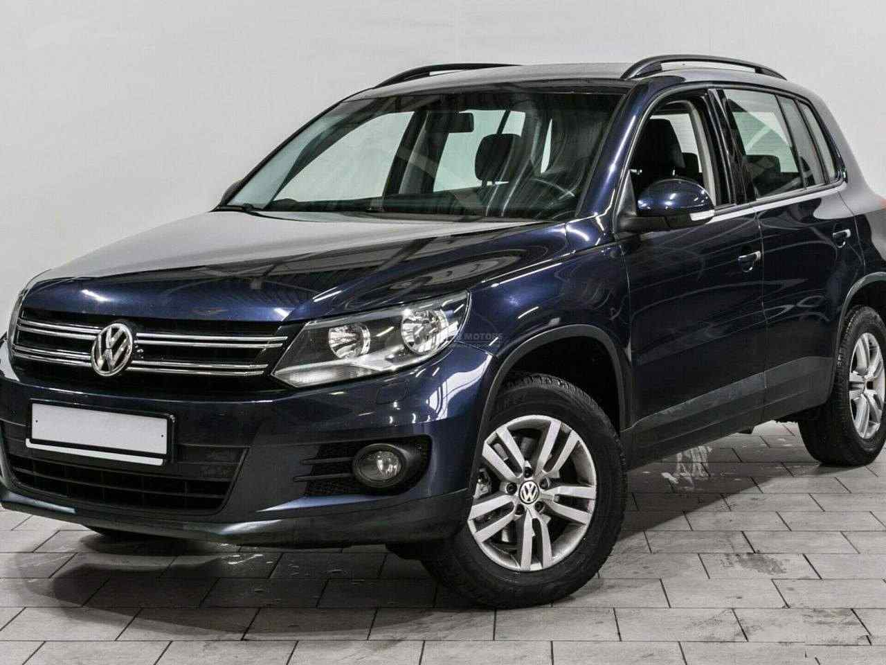 Volkswagen tiguan 1.4 mt. Тигуан г 2015. Тигуан 2015. Тигуан черный 2015.